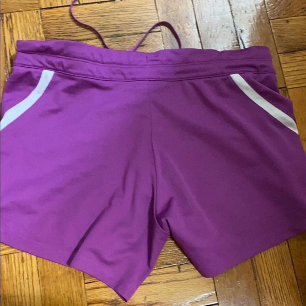 Nike purple dri-fit shorts with small pocket